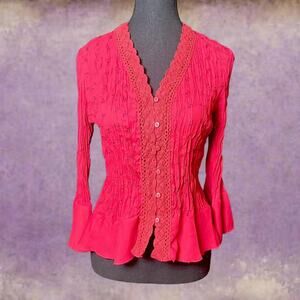 Red button up blouse with crochet details